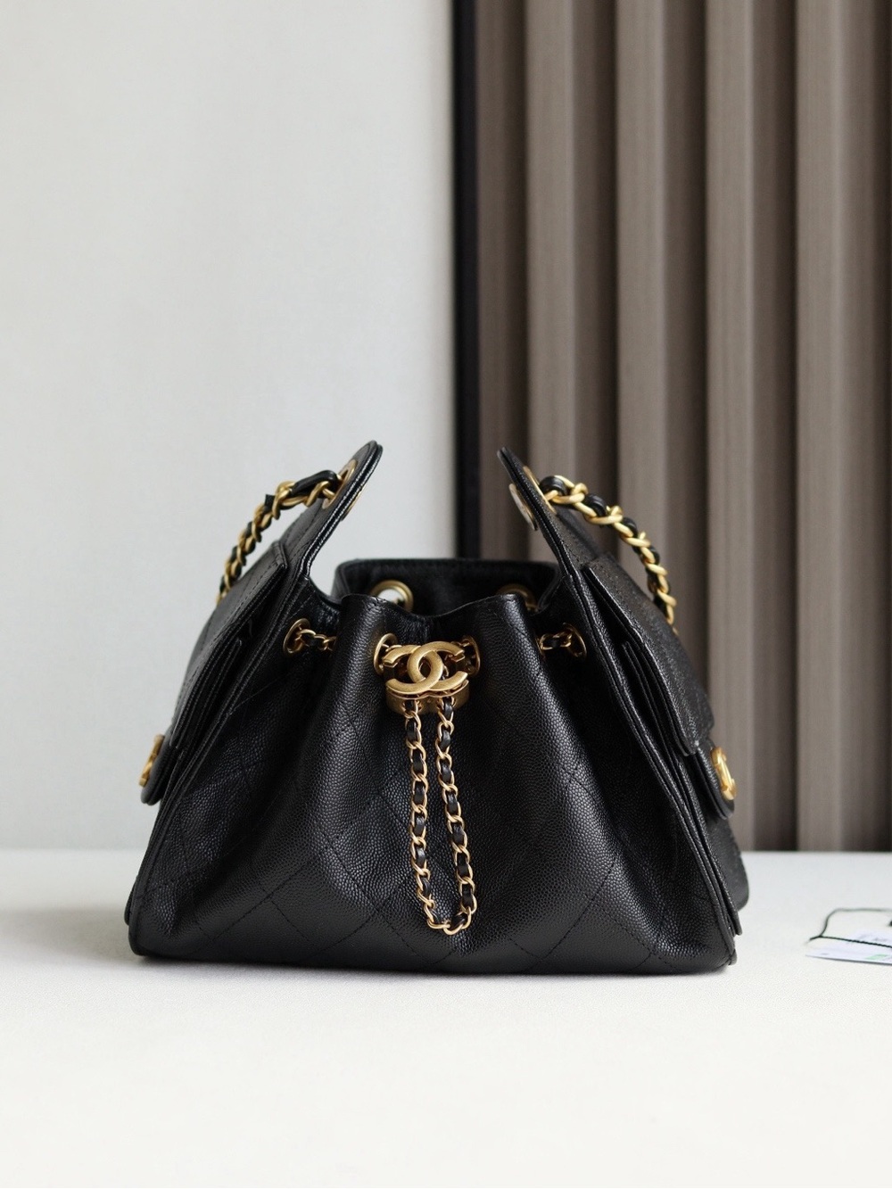 Chanel Luxury Black Quilted Leather Shoulder Bag with Gold Chain Drawstring